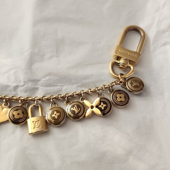 LOUIS VUITTON - AUTHENTIC, VINTAGE, AND RARE LOGO CHARM BRACELET - Picture 5 of 10
